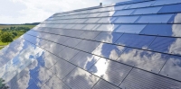 Элон Маск планирует выпускать солнечные крыши